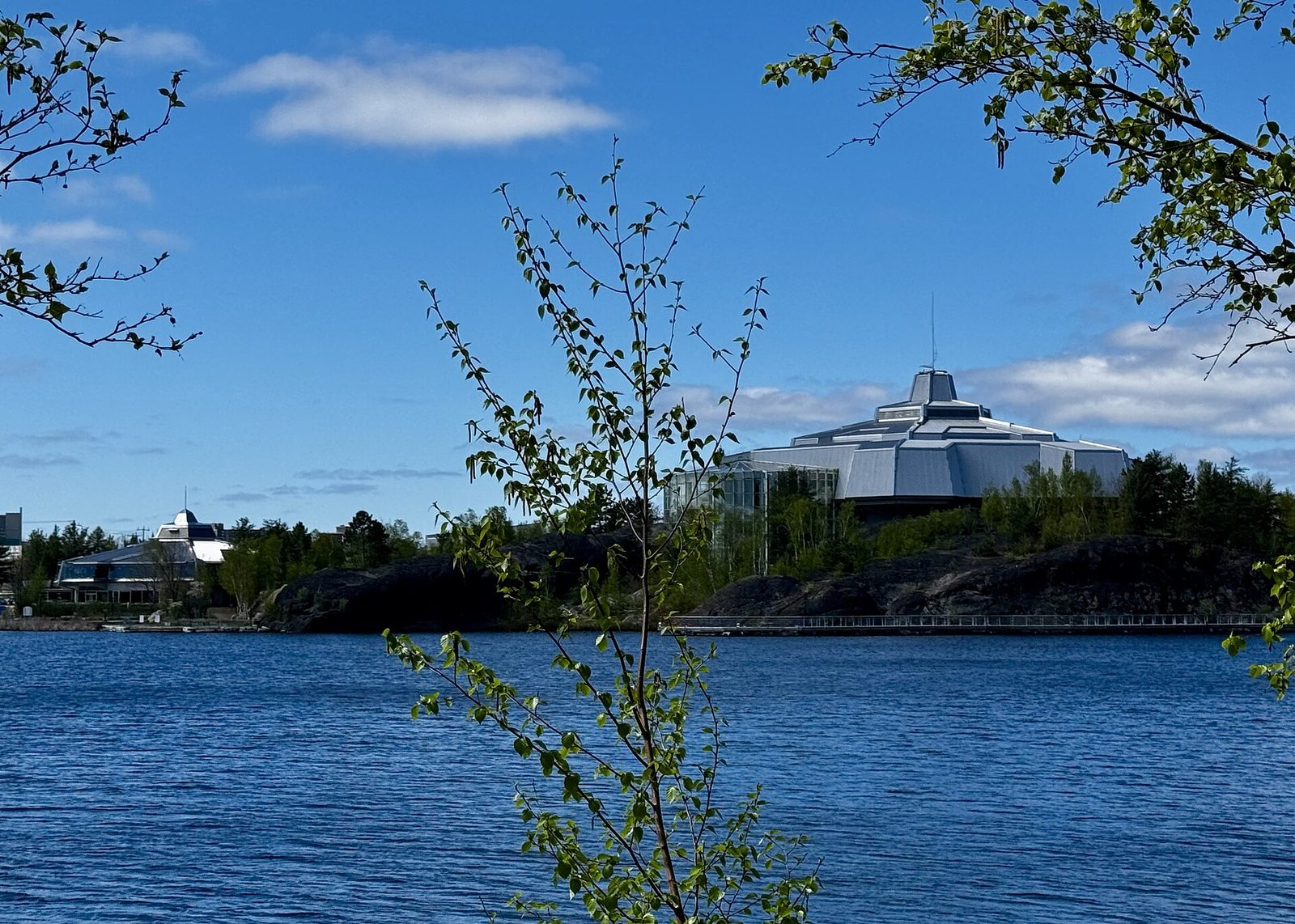 Science North across Ramsey Lake in Greater Sudbury, photographed by Platttenbau